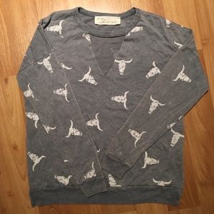 Distressed pull over. Never been worn.